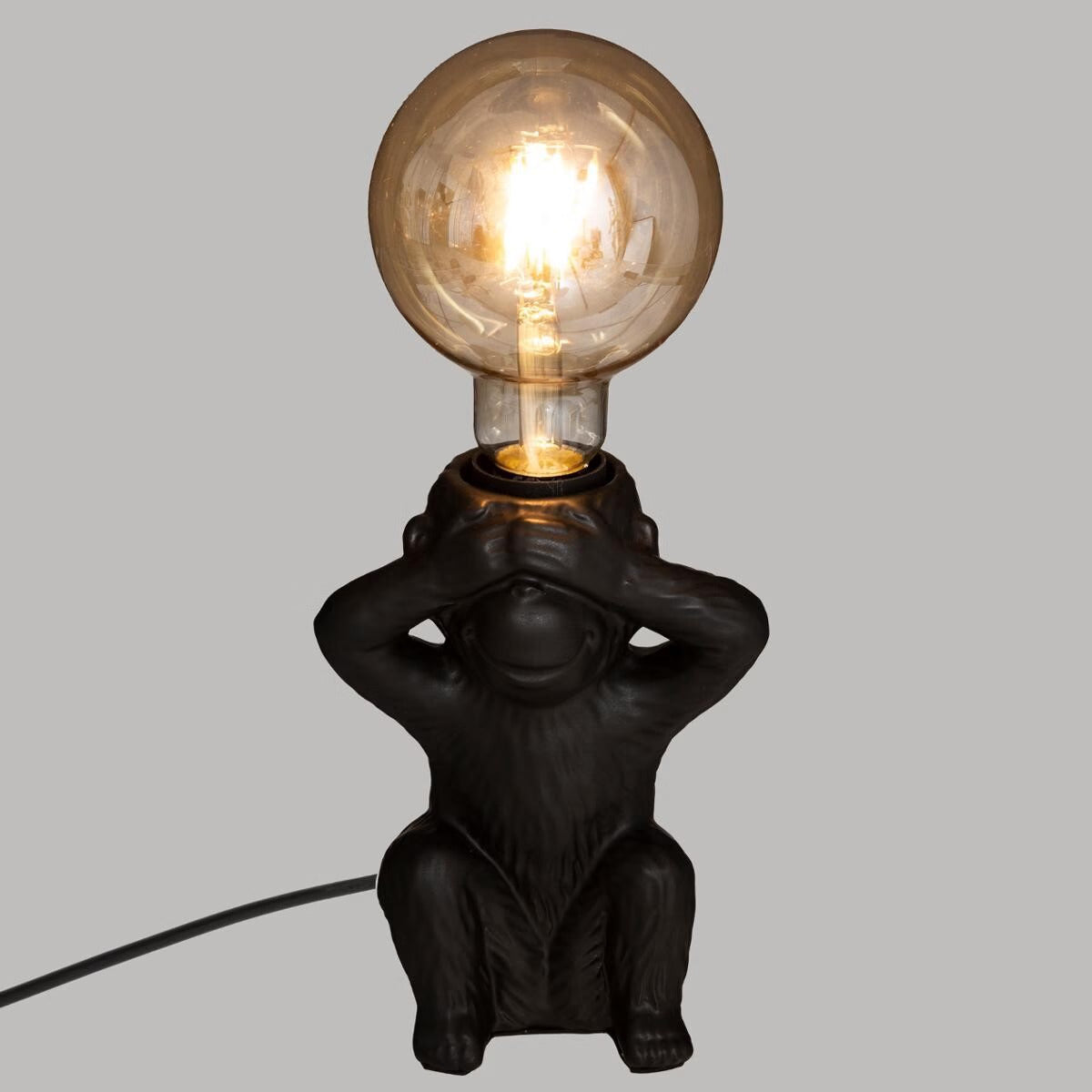 lampe singe assis